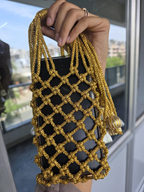 Golden Macrame Mobile Sling Bag with Shimmering Potli Tassels and Festive Zari Dori Work - bridal handbag